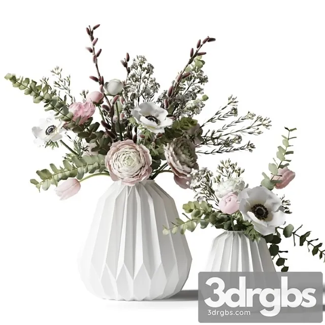 Two bouquets in white ribbed vases Two bouquets in white ribbed vases